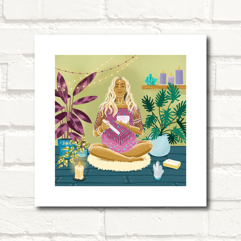 Woman meditating with crystal singing bowls